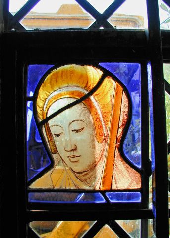 Stained Glass Window showing Lady in Flemish Hood at Weycroft Manor, North Devon