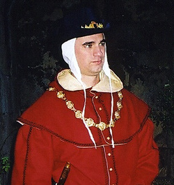 Red Wool Hood with liripipe, lined in Gold brocade with wooden buttons