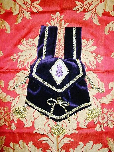 Purple velvet and gold brocade pouch with goldwork, silk shading and jewels reproduced from an ecclesiastical motif from an altar front