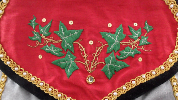 Detail of Hand embroidered Silk Ivy leaves with Goldwork Vines and Gold Spangles